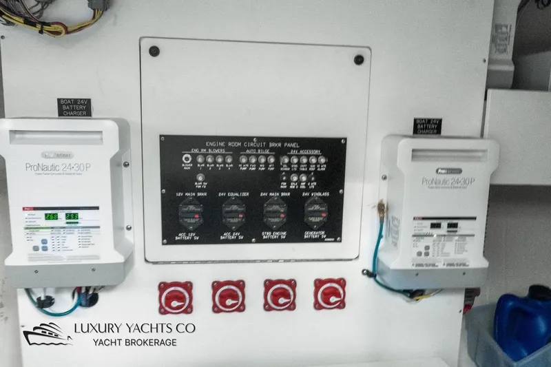  Yacht Photos Pics Engine room circuit panel of 2015 Cruisers Yachts 540 with ProNautic battery chargers.