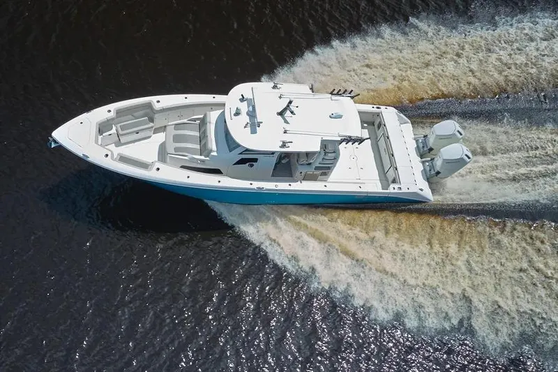  Yacht Photos Pics Aerial view of 2022 Solace 41 CS boat cruising on water.