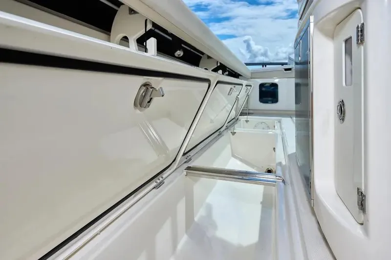  Yacht Photos Pics 2022 Solace 41 CS boat interior with storage compartments and sleek design.