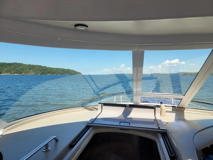  Yacht Photos Pics View from the helm of a 2003 Sea Ray 390 Motor Yacht on open water.