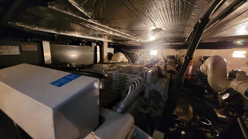  Yacht Photos Pics Engine room of a 2003 Sea Ray 390 Motor Yacht with visible machinery.