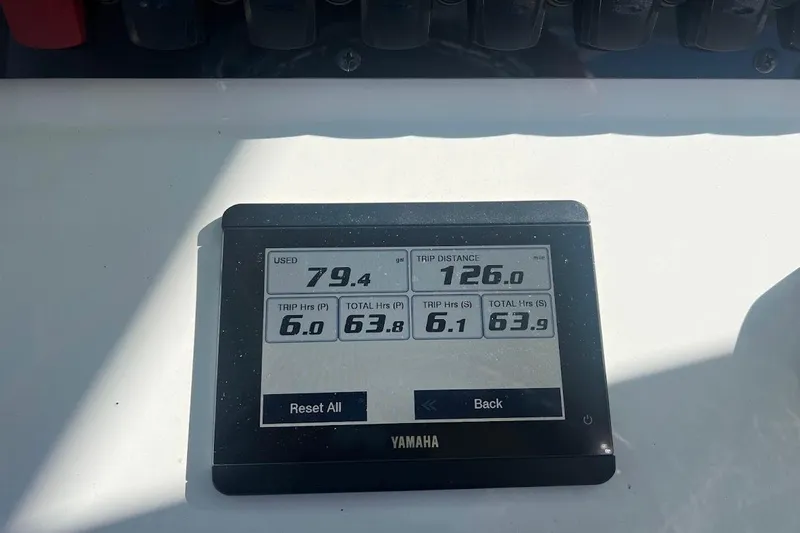 Wrecking Ball Yacht Photos Pics Yamaha display showing trip data on 2023 Sea Hunt Ultra 305 SE boat.