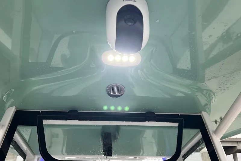 Wrecking Ball Yacht Photos Pics 2023 Sea Hunt Ultra 305 SE boat interior with LED lights and sleek design.