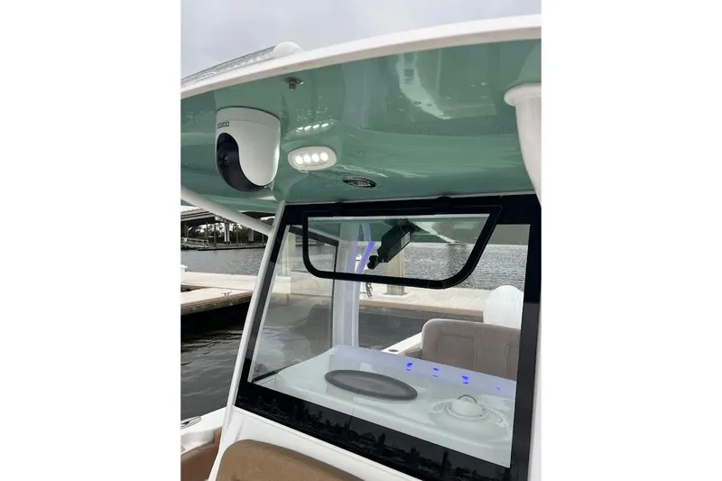 Wrecking Ball Yacht Photos Pics 2023 Sea Hunt Ultra 305 SE boat interior with modern features and sleek design.