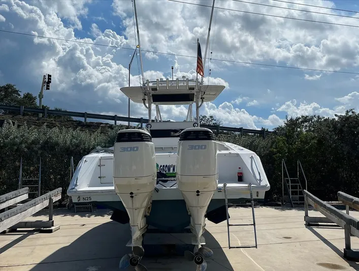 Growing Grass Yacht Photos Pics 2004 Venture 34 Center Console boat with twin 300 horsepower engines.