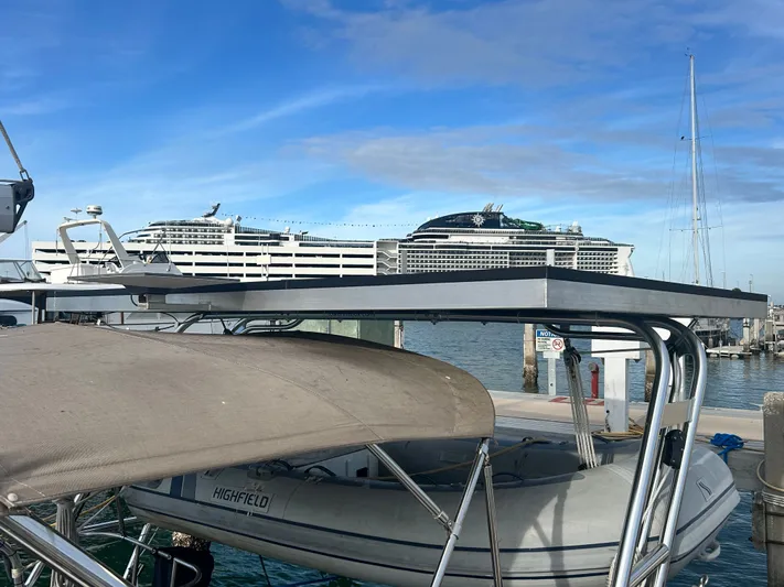 Top Dog Yacht Photos Pics Hunter 38 Ft Sloop 2006 docked with cruise ship in background.
