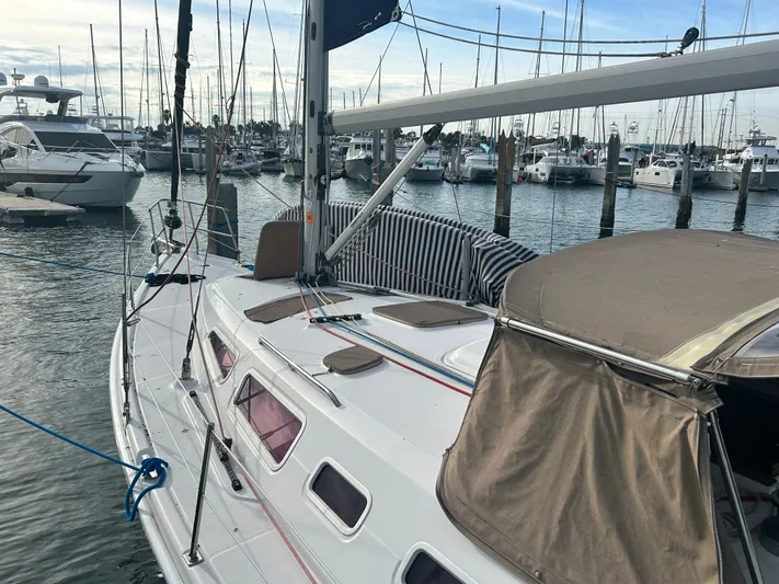 Top Dog Yacht Photos Pics 2006 Hunter 38 Ft Sloop docked in marina.