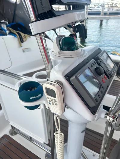 Top Dog Yacht Photos Pics 2006 Hunter 38 Ft Sloop helm with navigation equipment.