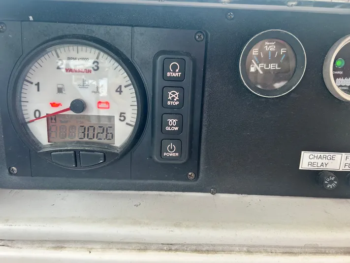 Top Dog Yacht Photos Pics Dashboard of a 2006 Hunter 38 Ft Sloop with Yanmar gauges.