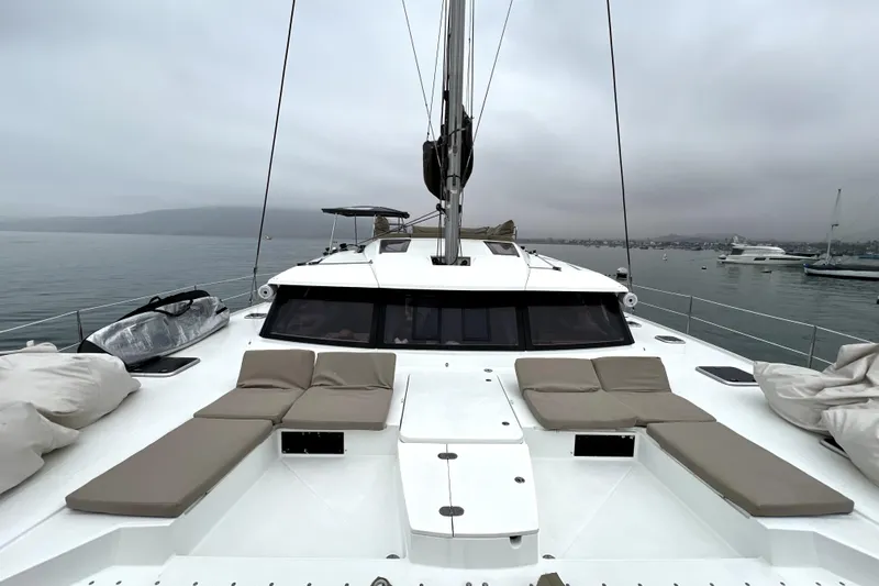 4life Yacht Photos Pics 2016 Fountaine Pajot SABA 50 catamaran with spacious deck and cushioned seating.