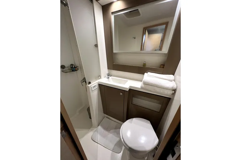 4life Yacht Photos Pics Modern bathroom in 2016 Fountaine Pajot SABA 50 yacht with shower and vanity.