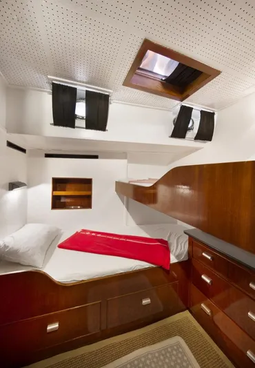 Atalanta J Yacht Photos Pics Cozy cabin interior of 1958 Feadship ATALANTA J yacht with wooden furnishings and skylight.