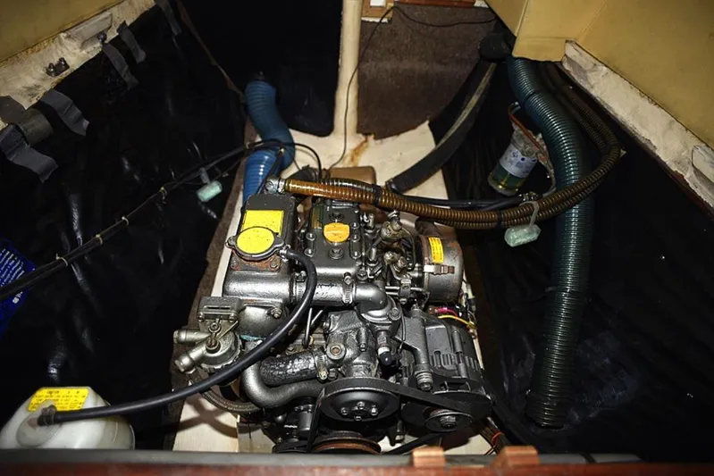 Mersea Yacht Photos Pics Engine compartment of 1997 Fountaine Pajot Athena 38 catamaran, showcasing mechanical components.