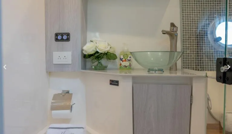 Ready For Immediate Delivery Yacht Photos Pics Luxurious bathroom in 2025 Hanover 387 Grey & Black Edition Outboard boat.