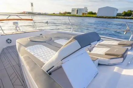 Ready For Immediate Delivery Yacht Photos Pics 2025 Hanover 387 Grey & Black Edition Outboard boat with luxurious seating on deck.