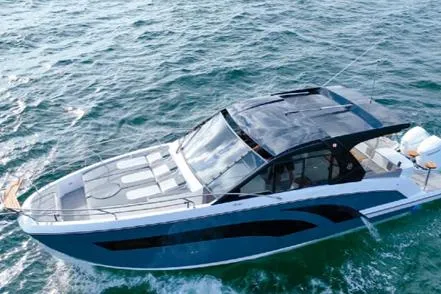 Ready For Immediate Delivery Yacht Photos Pics 2025 Hanover 387 Grey & Black Edition Outboard cruising on open water.