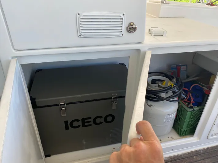 Hh Sound Waves Yacht Photos Pics Storage compartment on a 2008 Lagoon 420 Hybrid with ICECO cooler and equipment.