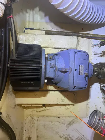 Hh Sound Waves Yacht Photos Pics Engine component of a 2008 Lagoon 420 Hybrid yacht, featuring cables and ventilation hoses.