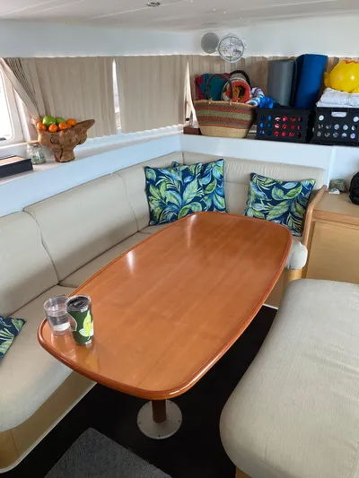 Hh Sound Waves Yacht Photos Pics Interior of 2008 Lagoon 420 Hybrid yacht with cozy seating and decorative pillows.