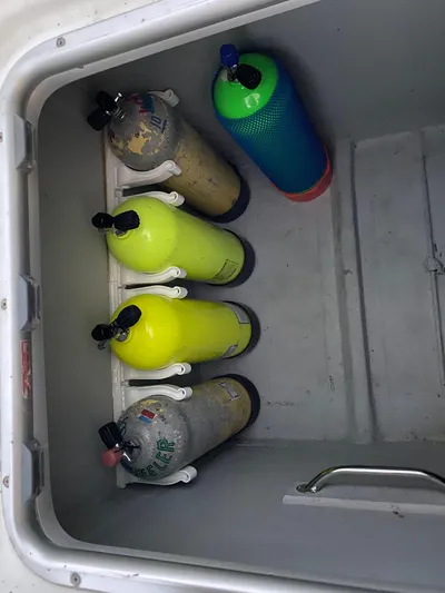 Hh Sound Waves Yacht Photos Pics Storage compartment with scuba tanks on a 2008 Lagoon 420 Hybrid.