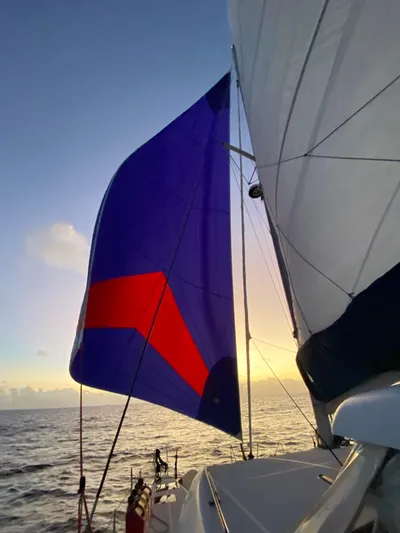 Hh Sound Waves Yacht Photos Pics Sailing on a 2008 Lagoon 420 Hybrid at sunset with vibrant sails.