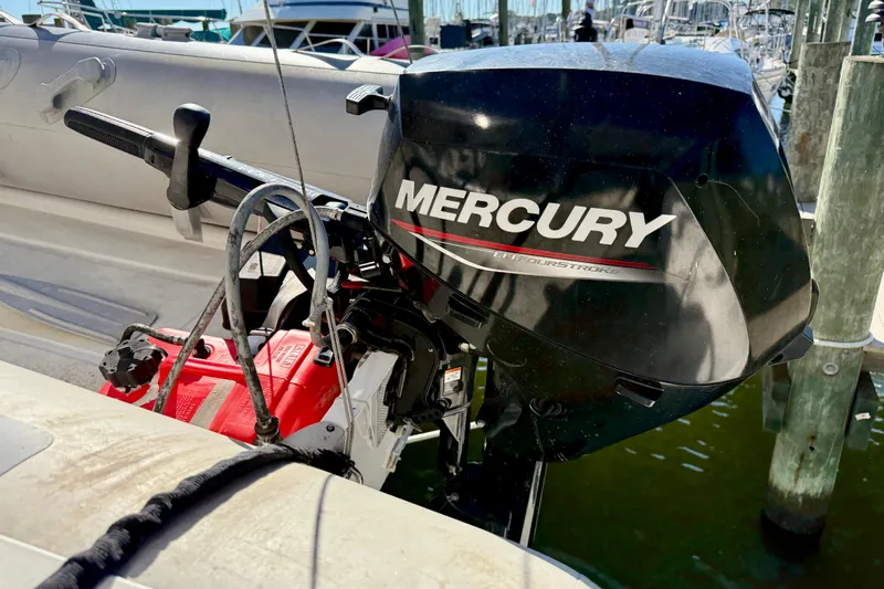 Way Maker Yacht Photos Pics Outboard motor on a 2010 Leopard 38 catamaran at a marina.