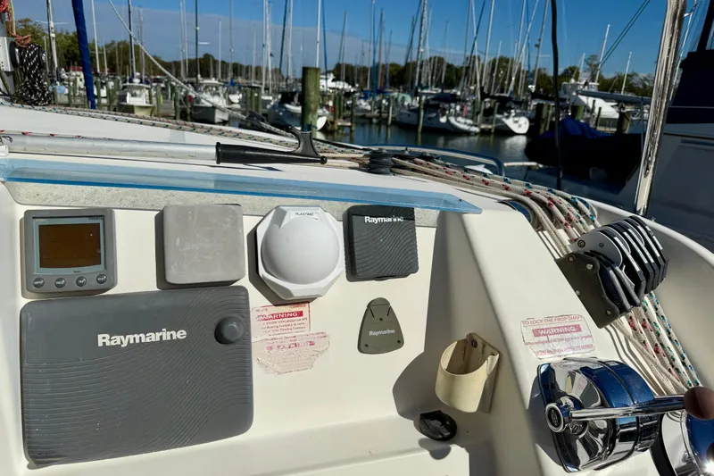 Way Maker Yacht Photos Pics Control panel of a 2010 Leopard 38 catamaran with Raymarine equipment at a marina.
