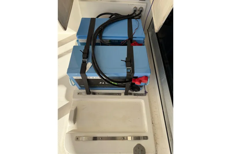 Way Maker Yacht Photos Pics Blue batteries secured in a compartment of a 2010 Leopard 38 boat.
