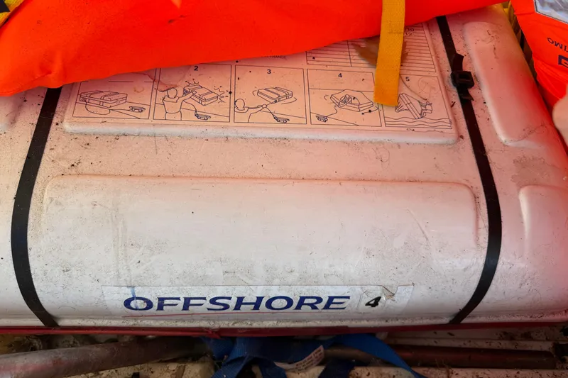Way Maker Yacht Photos Pics Life raft container with instructions, labeled "Offshore 4," on a Leopard 38, 2010 model.