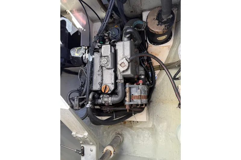 Way Maker Yacht Photos Pics Engine compartment of a 2010 Leopard 38 catamaran, showcasing mechanical components.