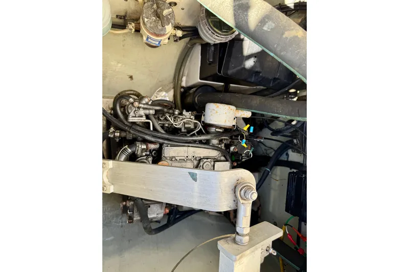 Way Maker Yacht Photos Pics Engine compartment of a 2010 Leopard 38, showcasing mechanical components and wiring.