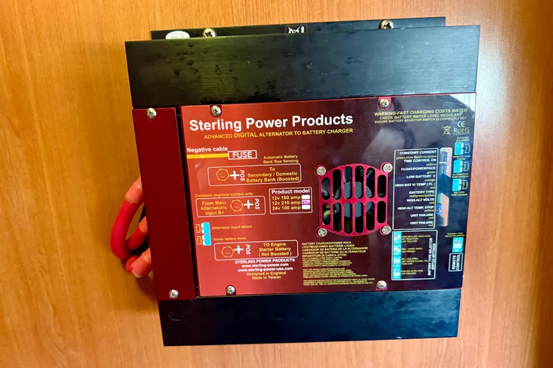 Way Maker Yacht Photos Pics Sterling Power Products battery charger on Leopard 38, 2010 model, mounted on wooden surface.