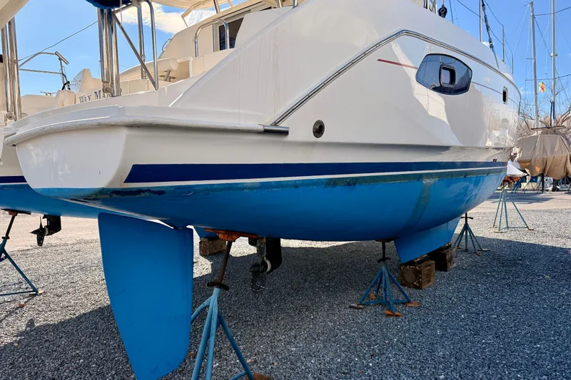 Way Maker Yacht Photos Pics 2010 Leopard 38 catamaran on stands, showcasing blue hull and sleek design.