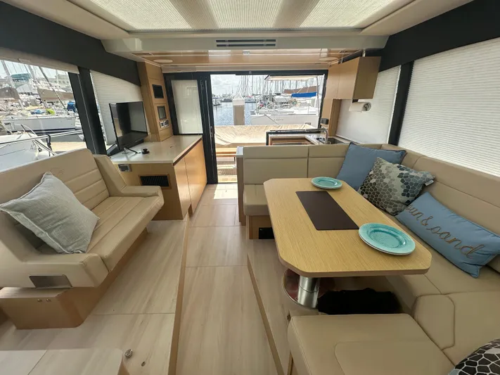 Nan Sea Cay Yacht Photos Pics Luxurious interior of 2020 Sealine C430 yacht with modern seating and dining area.