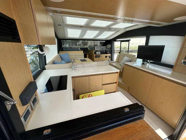 Nan Sea Cay Yacht Photos Pics Luxurious interior of 2020 Sealine C430 yacht with modern furnishings and sleek design.