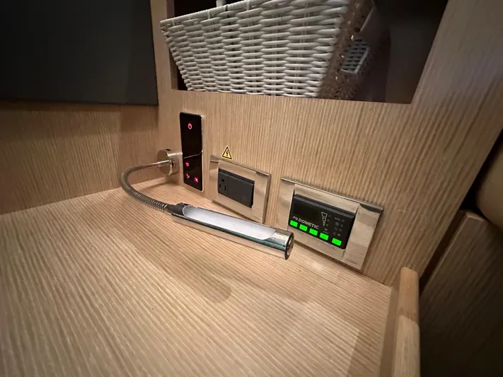 Nan Sea Cay Yacht Photos Pics Control panel and flexible reading light on 2020 Sealine C430 yacht interior.