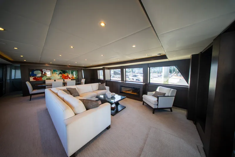 Encore Yacht Photos Pics Luxurious 1992 Crescent Custom yacht interior with modern seating and vibrant artwork.