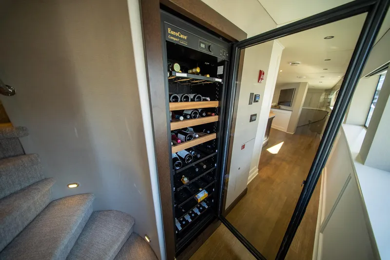 Encore Yacht Photos Pics Wine cooler in a luxurious 1992 Crescent Custom yacht interior.