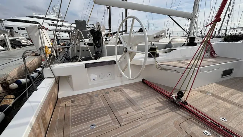 Zenith Yacht Photos Pics Italia Yachts 14.98, 2023 model, featuring a sleek deck and modern steering wheel.