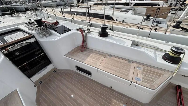Zenith Yacht Photos Pics Italia Yachts 14.98 (2023) deck with winches and seating, showcasing sleek design and functionality.