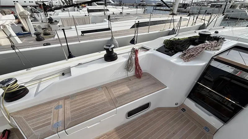 Zenith Yacht Photos Pics Italia Yachts 14.98, 2023 model, deck view with winches and ropes in marina.