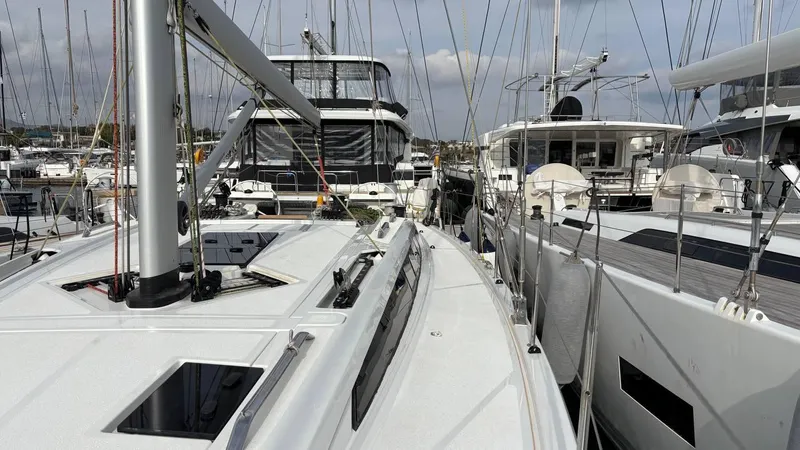 Zenith Yacht Photos Pics Italia Yachts 14.98 (2023) docked among other boats in a marina.