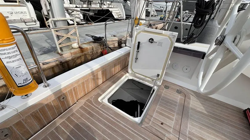Zenith Yacht Photos Pics Italia Yachts 14.98 (2023) deck with open hatch, showcasing sleek design and craftsmanship.