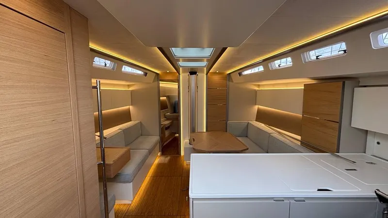 Zenith Yacht Photos Pics Luxurious interior of 2023 Italia Yachts 14.98, featuring modern design and ambient lighting.