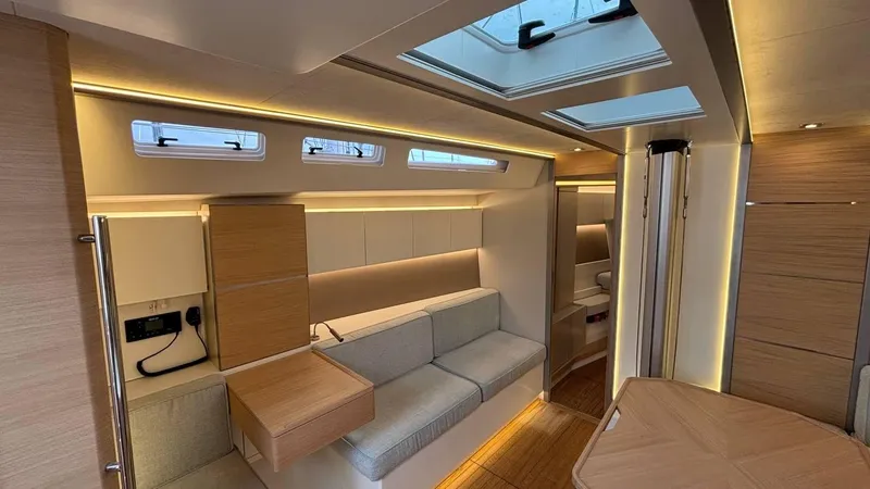 Zenith Yacht Photos Pics Luxurious interior of 2023 Italia Yachts 14.98, featuring modern design and ambient lighting.