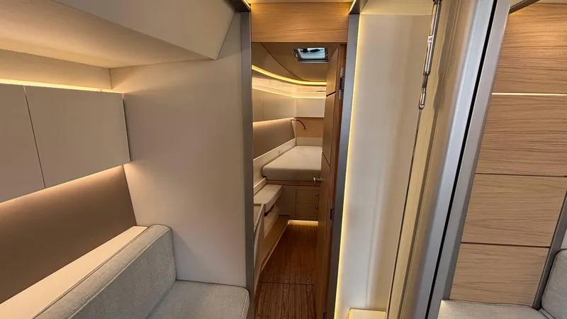 Zenith Yacht Photos Pics Luxurious interior of 2023 Italia Yachts 14.98, featuring modern design and ambient lighting.