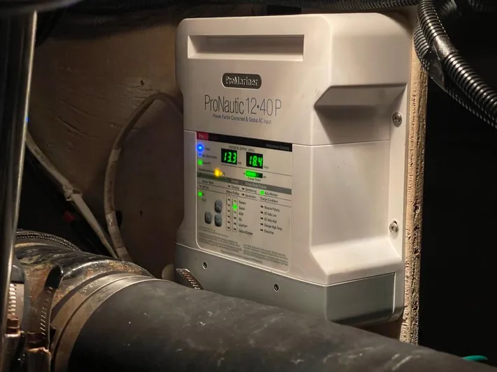 Open Time Yacht Photos Pics ProMariner ProNautic 1240P charger in 2006 Silverton 34 Convertible boat engine room.