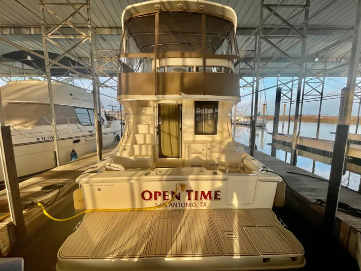 Open Time Yacht Photos Pics 2006 Silverton 34 Convertible boat docked, named "Open Time," in San Antonio, Texas.