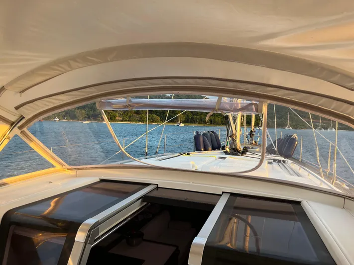  Yacht Photos Pics Beneteau Oceanis 58 sailboat deck view, 2011 model, on calm waters.