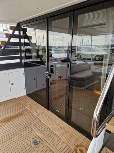 Yacht Photos Pics Azimut Magellano 60 yacht interior with sleek design and wooden flooring, 2025 model.